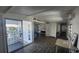 Open-concept living area with abundant windows and a seamless indoor-outdoor flow at 27466 Us Highway 19 N # 97, Clearwater, FL 33761