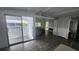 Open-concept living area with abundant windows and a seamless indoor-outdoor flow at 27466 Us Highway 19 N # 97, Clearwater, FL 33761