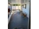 Relaxing screened porch area with outdoor seating and peaceful views at 27466 Us Highway 19 N # 97, Clearwater, FL 33761