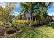 The home's backyard features lush landscaping and mature trees, providing a serene and private outdoor space at 3815 Gaviota Dr, Sun City Center, FL 33573