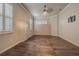 Spacious room with wood flooring, windows, and outlets at 3815 Gaviota Dr, Sun City Center, FL 33573