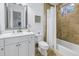 Clean bathroom design with shower/tub combination, featuring modern fixtures, a sleek vanity, and ample natural light at 751 34Th Ne Ave, St Petersburg, FL 33704
