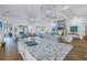 Open-concept kitchen featuring granite countertops, a large island, and stainless steel appliances at 751 34Th Ne Ave, St Petersburg, FL 33704