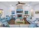Stylish living room featuring a fireplace, coffered ceiling and views of the water at 751 34Th Ne Ave, St Petersburg, FL 33704