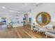 Bright living room with water view, stone fireplace, wood floors, and elegant decor at 751 34Th Ne Ave, St Petersburg, FL 33704