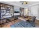 Well-appointed home office with custom shelving, a spacious desk, and a comfortable chair at 751 34Th Ne Ave, St Petersburg, FL 33704