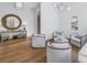 Cozy sitting room featuring hardwood floors, modern lighting, and elegant decor at 751 34Th Ne Ave, St Petersburg, FL 33704
