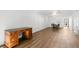 Open living space with an adjacent desk space offering functional living at 831 Maple Ct # 303, Dunedin, FL 34698