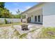 Backyard patio area with fire pit, perfect for relaxing and entertaining guests outdoors at 3611 19Th N St, St Petersburg, FL 33713