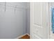 An interior view of the closet with metal shelving and wood floor at 3611 19Th N St, St Petersburg, FL 33713