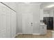 Welcoming entryway with closet and view of the kitchen at 3611 19Th N St, St Petersburg, FL 33713