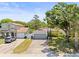 Lovely home with well-maintained front yard, two car garage and mature trees at 3611 19Th N St, St Petersburg, FL 33713