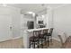 Kitchen island featuring seating with an open concept view of the kitchen at 3611 19Th N St, St Petersburg, FL 33713