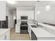Updated kitchen boasting white cabinetry, stainless steel appliances, and a convenient breakfast bar area at 3611 19Th N St, St Petersburg, FL 33713
