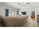 A living room features modern ceiling fan and doors to the patio at 3611 19Th N St, St Petersburg, FL 33713