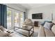 A living room with sliding glass doors to patio at 3611 19Th N St, St Petersburg, FL 33713
