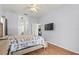 Comfortable bedroom featuring wood floors, soft lighting, and ample space at 3611 19Th N St, St Petersburg, FL 33713