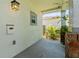 Side patio area providing a cozy outdoor space with stylish brick accents and ample natural light at 3611 19Th N St, St Petersburg, FL 33713