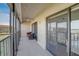 Enjoy the fresh air on this screened condo balcony, featuring tile floors and comfortable seating at 8711 Blind Pass Rd # 307A, St Pete Beach, FL 33706