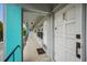 Exterior of a multi-unit dwelling with unit number 1210 on a long balcony at 4140 55Th N St # 1211, Kenneth City, FL 33709