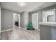 Hallway with gray walls and light wood-look floors at 451 Hartford Heights St, Spring Hill, FL 34609