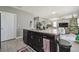 Kitchen island with sink, open layout with view to the living room and backyard at 451 Hartford Heights St, Spring Hill, FL 34609