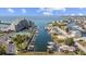 Scenic aerial shot of waterfront condo complex with boat docks and beautiful waterfront views at 6009 Sea Ranch Dr # 303, Hudson, FL 34667