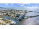 Elevated view of the condo community and waterways, with waterfront access and boat docks at 6009 Sea Ranch Dr # 303, Hudson, FL 34667