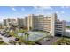 Beautiful elevated view of this beachfront condo, tennis courts, and mature landscaping at 6009 Sea Ranch Dr # 303, Hudson, FL 34667