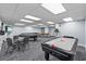 Spacious game room featuring air hockey, billiards, ping pong and card tables at 6009 Sea Ranch Dr # 303, Hudson, FL 34667