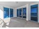 Spacious balcony featuring sliding glass doors for seamless indoor-outdoor living and breathtaking ocean views at 1350 Gulf Blvd, Clearwater, FL 33767
