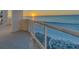 Balcony view featuring clear railings overlooking the beach with a beautiful sunset on the ocean at 1350 Gulf Blvd, Clearwater, FL 33767