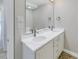 Elegant bathroom featuring double sinks and dark bronze fixtures in a contemporary design at 1350 Gulf Blvd, Clearwater, FL 33767