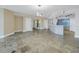 Open-concept living space with modern finishes flowing seamlessly into the kitchen area at 1350 Gulf Blvd, Clearwater, FL 33767