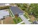 An aerial view of the house showing roof, driveway, and landscaping at 1905 W Erna Dr, Tampa, FL 33603