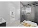Modern bathroom featuring a soaking tub, glass enclosed shower, and double sink vanity at 1905 W Erna Dr, Tampa, FL 33603