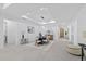 Bright dining area with modern lighting and stylish decor flows seamlessly into other living spaces at 1905 W Erna Dr, Tampa, FL 33603
