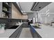 Modern kitchen featuring sleek cabinets, stainless steel appliances, and ample counter space for cooking and entertaining at 1905 W Erna Dr, Tampa, FL 33603