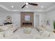 Cozy living room with modern fireplace, recessed lighting, and plush seating perfect for relaxation at 1905 W Erna Dr, Tampa, FL 33603