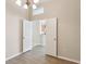 Bright dining room featuring a chandelier and doorway view to kitchen at 31447 Shaker Cir, Wesley Chapel, FL 33543