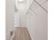 Walk-in closet featuring wood floors and wire shelves at 31447 Shaker Cir, Wesley Chapel, FL 33543
