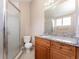 Updated bathroom with granite countertop and tile flooring at 9406 Citrus Glen Pl, Tampa, FL 33618
