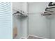 Walk-in closet with wire shelving providing ample storage space at 1600 Gray Bark Dr, Oldsmar, FL 34677