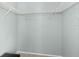 Walk-in closet with wire shelving providing ample storage space at 1600 Gray Bark Dr, Oldsmar, FL 34677