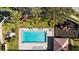 Aerial shot of community pool with adjacent playground and restroom facilities at 1600 Gray Bark Dr, Oldsmar, FL 34677