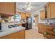 Functional kitchen offering ample counter space, modern appliances, and plenty of cabinet storage at 3616 W Morrison Ave, Tampa, FL 33629