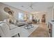 Open living and dining area with neutral decor, stylish furnishings, and plenty of natural light at 3616 W Morrison Ave, Tampa, FL 33629