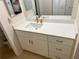 Bathroom vanity features a white countertop, sink, and drawers at 169 Medallion Blvd # E, Madeira Beach, FL 33708