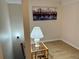 Comfortable hallway with wood flooring and view of stairs at 169 Medallion Blvd # E, Madeira Beach, FL 33708