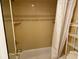 Shower with ceramic tile and curtain at 169 Medallion Blvd # E, Madeira Beach, FL 33708